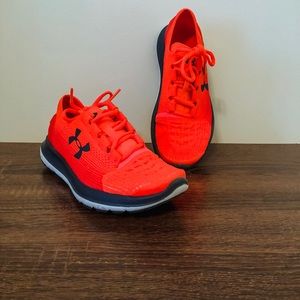 Neon orange and red Under Armour Running Shoes